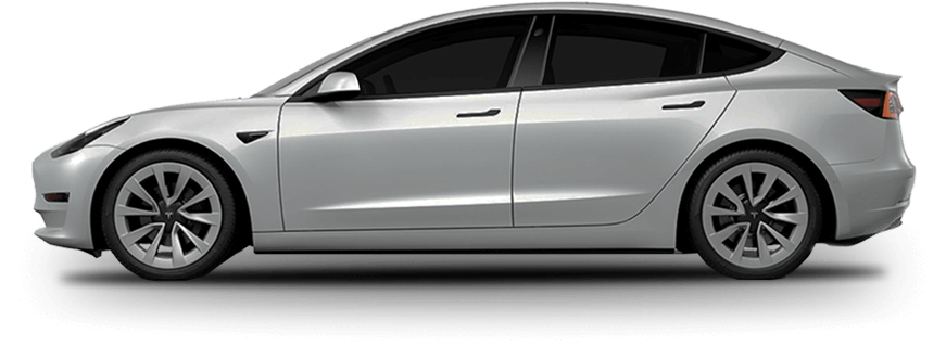 Silver Tesla Model 3 viewed from the side with factory-style tinted windows and aerodynamic contours.