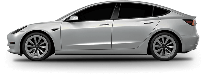 Side profile of a silver Tesla Model 3 with tinted windows and streamlined body design. The vehicle is parked on a plain backdrop, showcasing its clean lines and modern aesthetic.