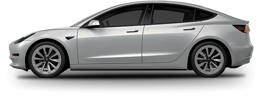 Side profile of a silver Tesla Model 3 with tinted windows and clean, aerodynamic lines.