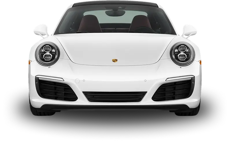 Front view of a white Porsche 911 sports car with LED headlights, a sleek aerodynamic design, and the Porsche emblem centered on the hood. The car's low stance and wide front grille emphasize its performance-focused styling.