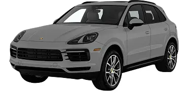 Front three-quarter view of a grey Porsche Cayenne SUV with dark accents, sporty alloy wheels, and a bold, modern design.