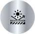Silver circular icon featuring a sun above a surface with an arrow bouncing off, symbolizing UV protection or heat rejection.